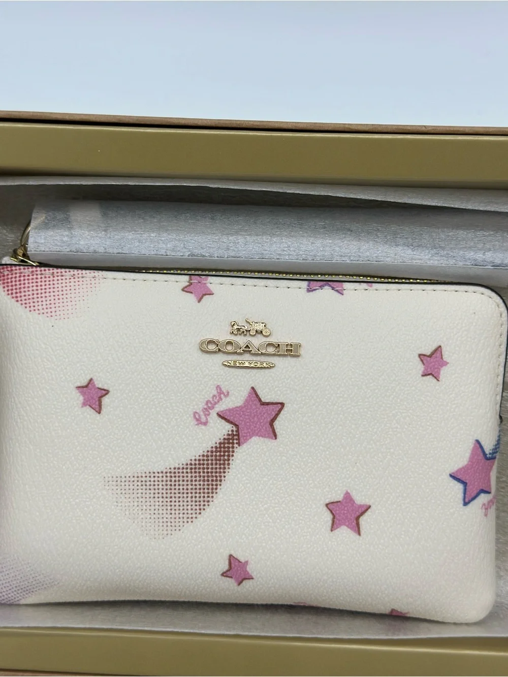 Coach White Wristlet with Pink Star Motif and Gold Charm